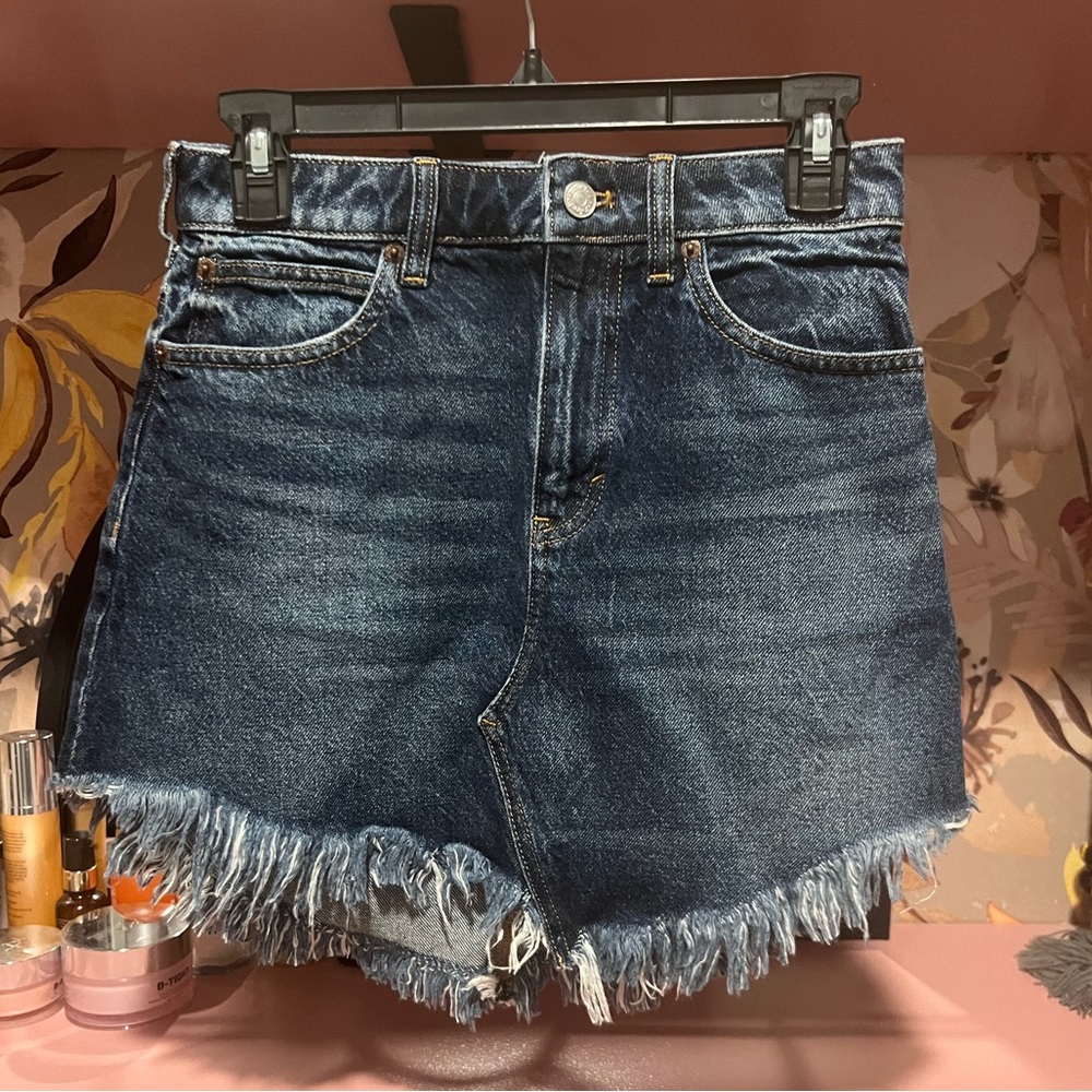 We the Free Bailey blue denim mini skirt raw hem.